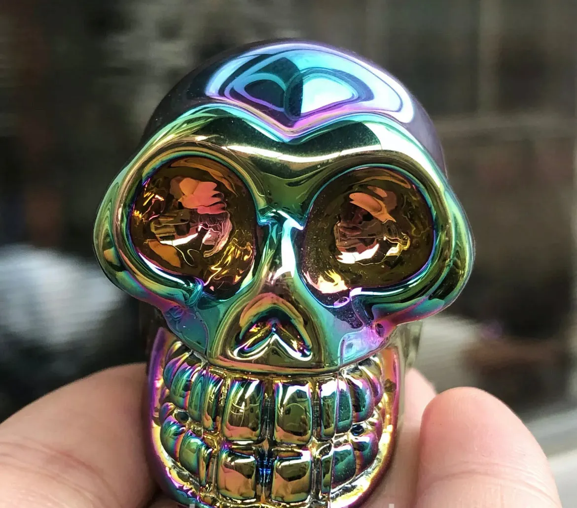 Rainbow Titanium Aura quartz gemstone carved skull