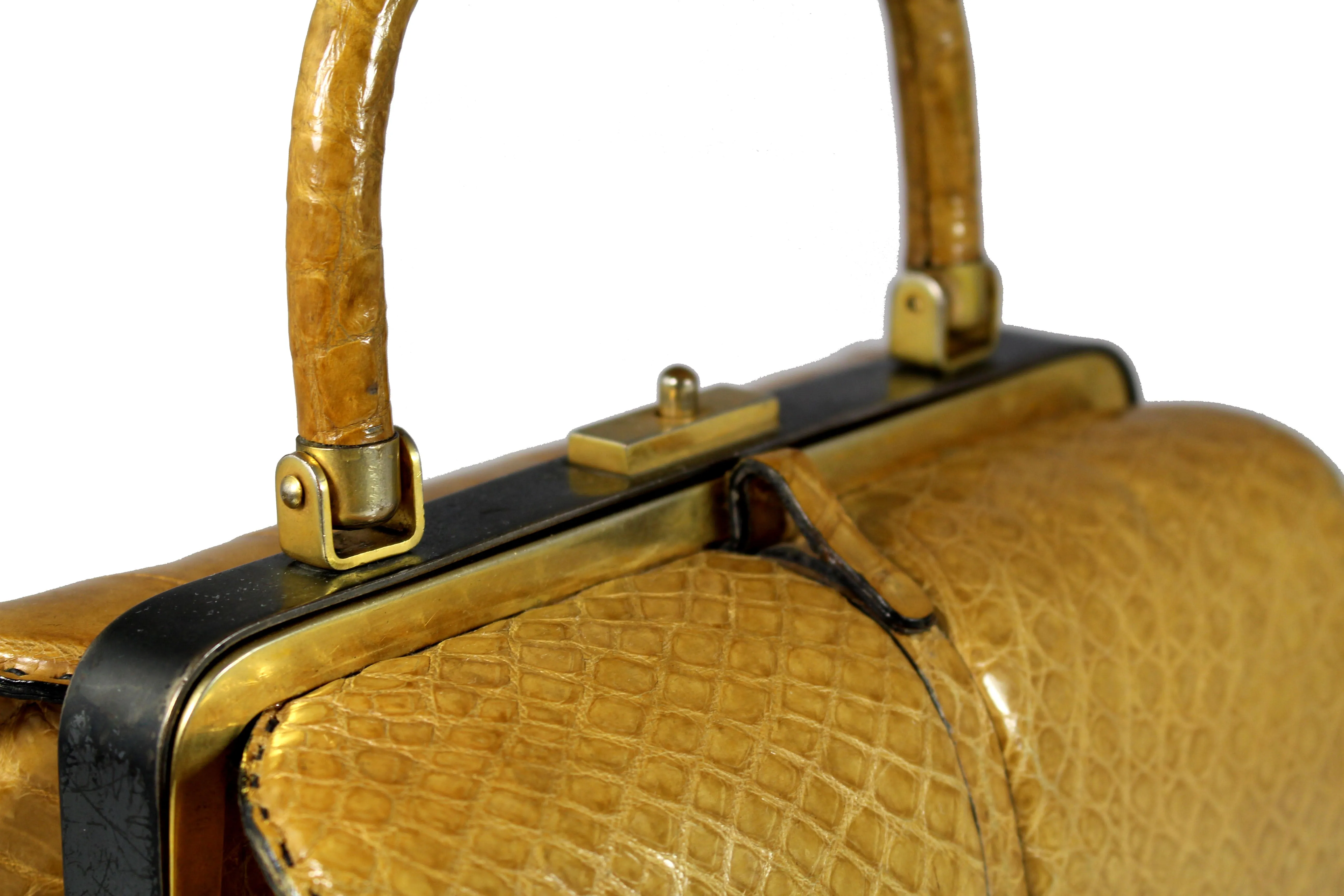 WIEN cylindrical caramel crocodile skin handbag